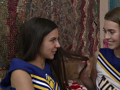 Little cheerleader kisses and licks her girlfriend before she gets put on her face
