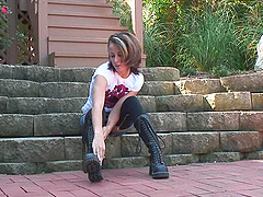 Putting on big black boots and cock teasing in the park