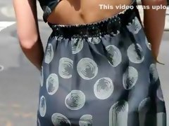 Woman Wearing See Through Dress in the Streets