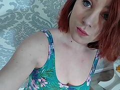 Amateur redhead films herself while playing with a toy
