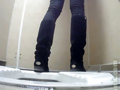 Pale skin round pretty butt filmed in the public restroom
