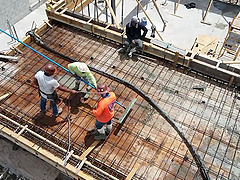 Reality outdoors video of some guys doing construction in HD